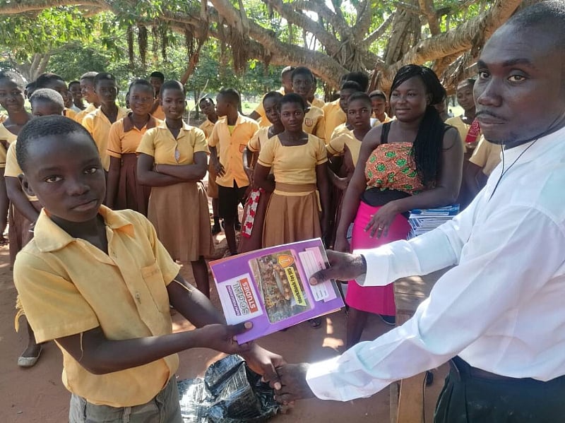 Patrick Sarfo donates books to Bruce J.H.S at Sekyeredumase