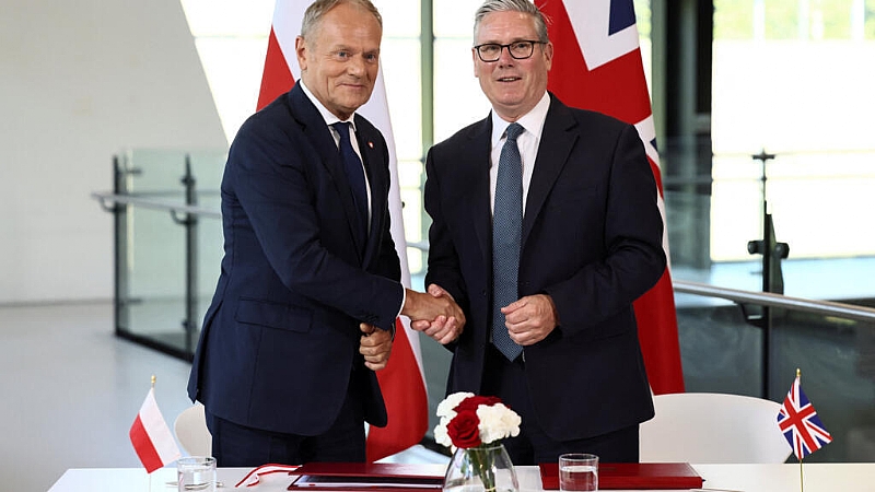 Starmer and Tusk sign UK–Poland defence pact amid warnings o...