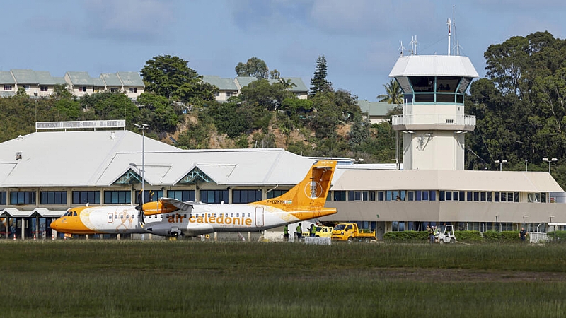 New Caledonia airport reopens after month-long closure during deadly ...