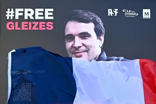 French journalist held in Algeria drops appeal, hoping for pa
