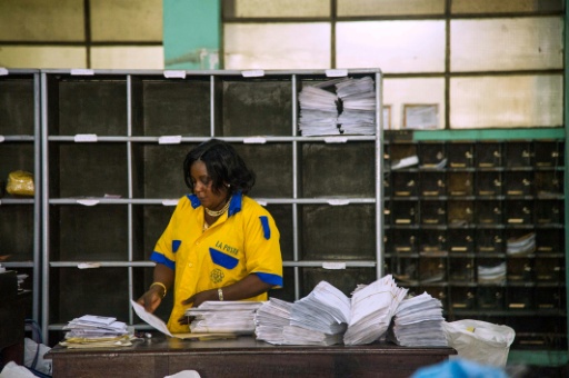 People of Kinshasa welcome back their postmen