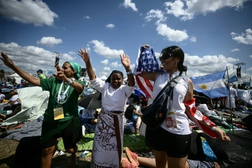 Elation as pope arrives by helicopter to open-air youth vigil in Rome