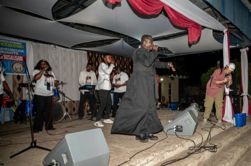 Prayer, psalms -- and rap: Kinshasa priest engages youth