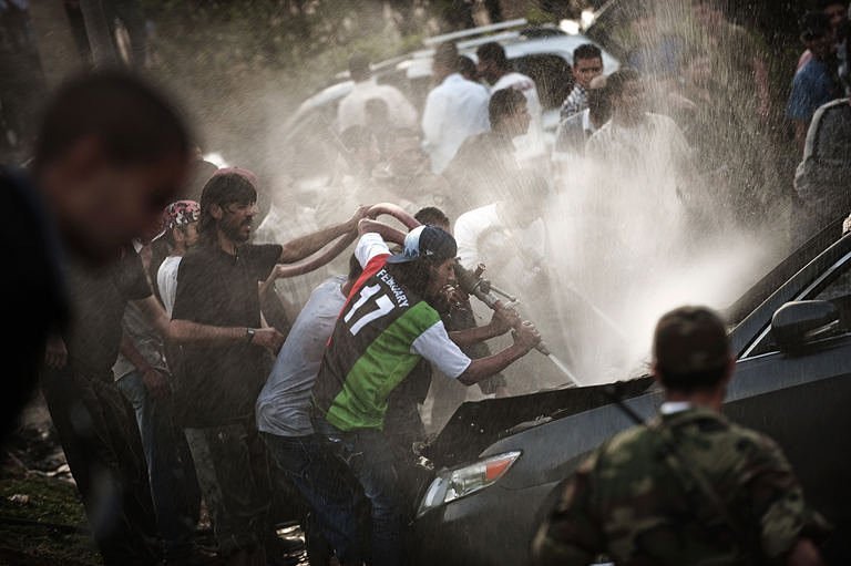 NATO raids rock Tripoli as UN denounces war crimes