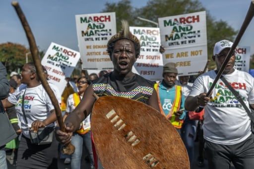 South Africa's Ramaphosa calls for African action on migrati...