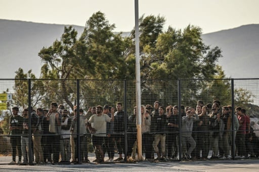 Greece freezes asylum claims over migrant 'invasion' from Libya