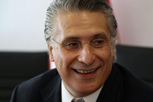 Detained Tunisia mogul's party presses on with presidential bid