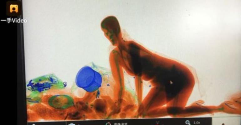 Woman Reportedly Goes Through Train Station's X-Ray Machine To Hold Onto Purse Woman Reportedly Goes Through Train Station's X-Ray Machine To Hold Onto Purse