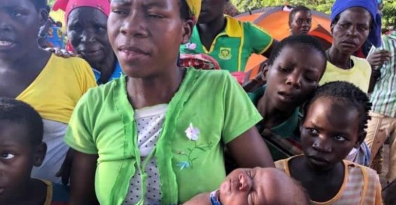 Mozambique Woman Gives Birth Up A Tree