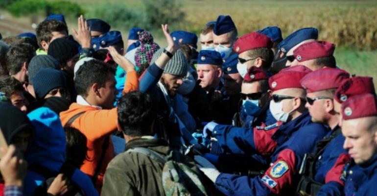 EU sanctions Hungary, Poland, Czechs over refugees