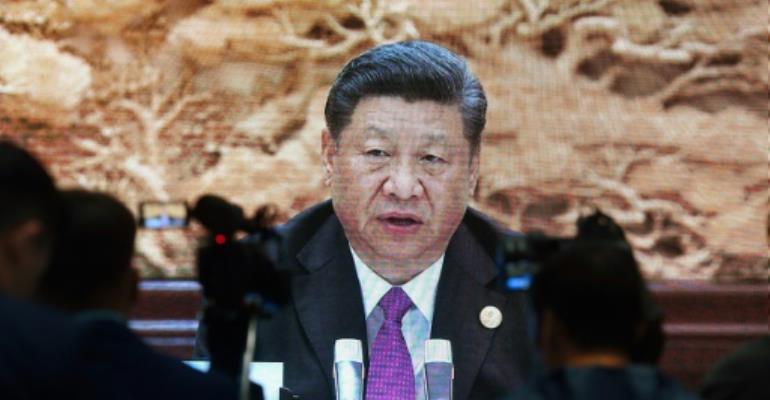 Xi says to reject protectionism, open up Belt and Road