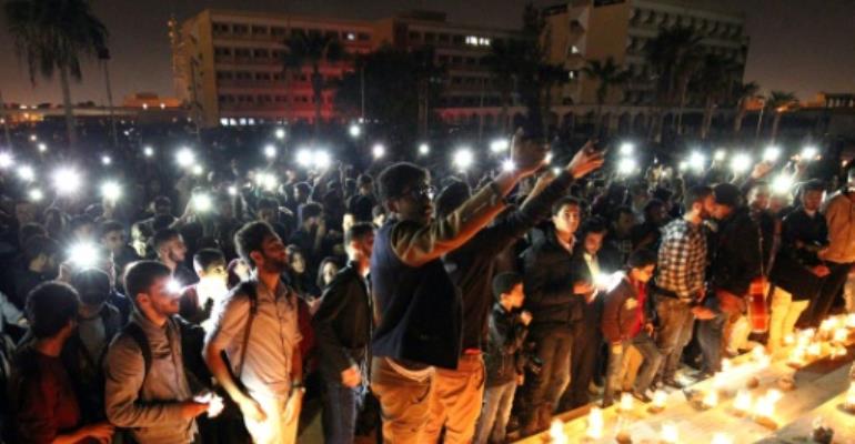 AFP photographer Abdullah Doma took this picture of Libyans attending a candlelit concert marking 