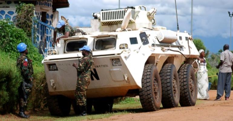 Rebels from a Ugandan-dominated group attacked a UN military base in DR Congo's unstable east, killing one peacekeeper and injuring 12 others, the UN mission said.  By ALAIN WANDIMOYI (AFP/File)