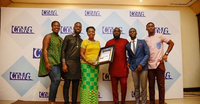 Madam Esther Cobbah, CEO of Stratcomm Africa (3rd from left) with staff of Stratcomm Africa
