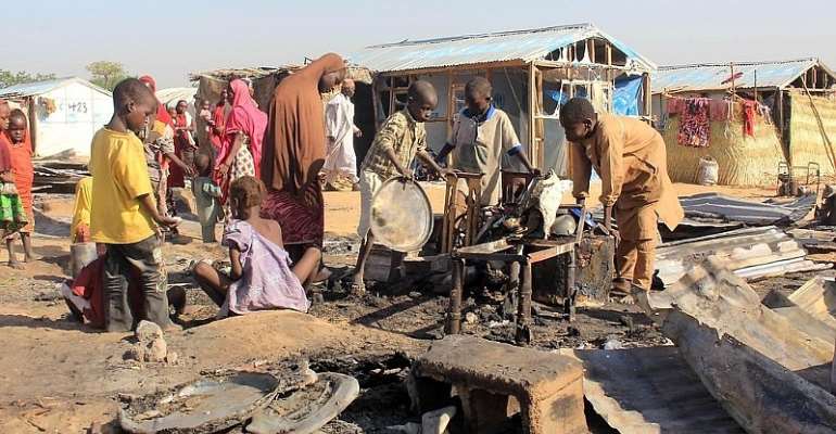 Nigeria's 60th anniversary scarred by economic uncertainty, Islamic insurgency