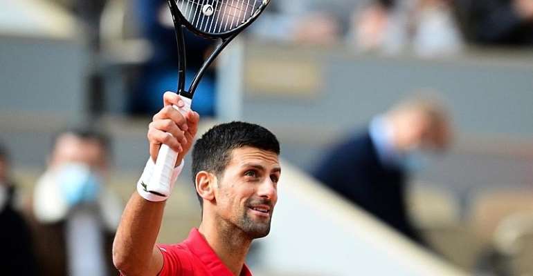 Djokovic crushes Berankis to waltz into third round at French Open