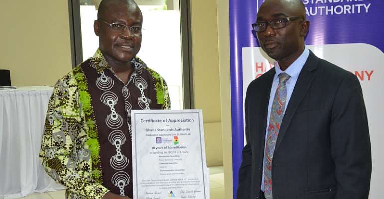 Prof. Dodoo, GSA Director-General (Left) and Dr Akwasi Achampong, GSA Board Chairman after receiving a certificate of accreditation from Daaks, A German Accreditation Agency