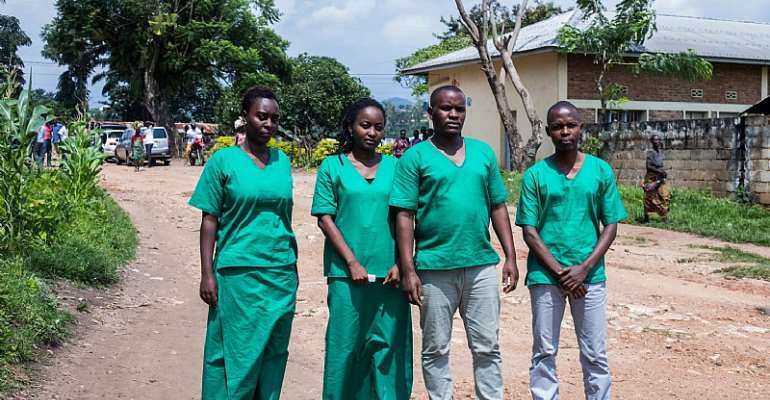Four Iwacu journalists are seen at the High Court in Bubanza, western Burundi, on December 30, 2019. CPJ today joined a call for their release. (AFP/Tchandrou Nitanga)