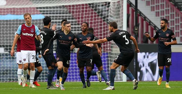 PHIL FODEN OF MANCHESTER CITY CELEBRATES WITH TEAMMATES
IMAGE CREDIT: GETTY IMAGES