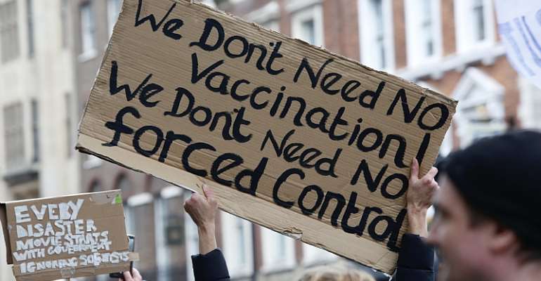 The increasingly well-coordinated global anti-vaccine movement has repurposed itself to challenge the very reality of COVID-19. - Source: Hasan Esen/Anadolu Agency via Getty Images