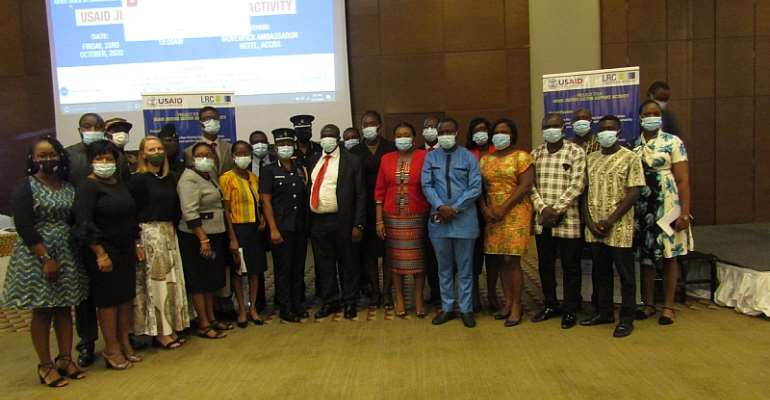 His Lordship Justice Samuel Marful-Sau, Justice of the Supreme Court (Representing the Chief Justice), His Lordship Justice Dennis Dominic Adjei, Justice of the Court of Appeal, Ms. Molly Schaefer, SGI Coordinator, US Embassy and other participants in a group photo