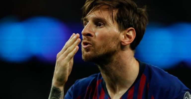 Barcelona's Lionel Messi celebrates after scoring his second and Barcelona's fourth goal. Photograph: Tom Jenkins/Guardian