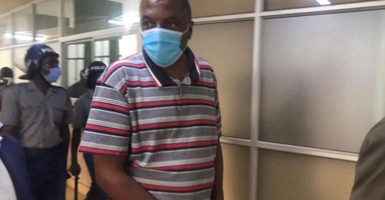 Zimbabwean journalist Hopewell Chin'ono, pictured here during a recent court appearance, was denied bail in an obstruction of justice case on November 12. (Frank Chikowore)