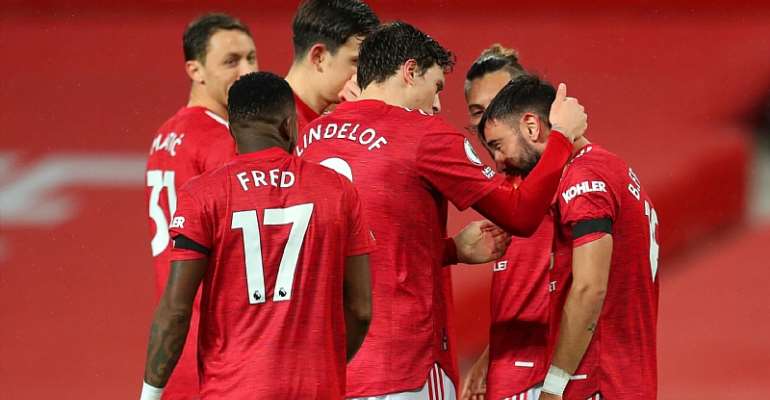 Bruno Fernandes of Manchester United celebrates with teammate Victor Lindelof after scoring his team's first goal during the Premier League match between Manchester United and West Bromwich Albion at Old Trafford
Image credit: Getty Images