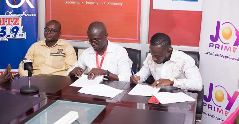 Okyeame Kwame signing partnership with Multimedia