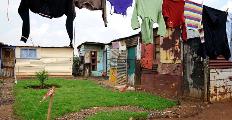 Growing poverty and unemployment have seen shacklands mushroom in post-apartheid South Africa. - Source: Frédéric Soltan/Corbis via Getty Images