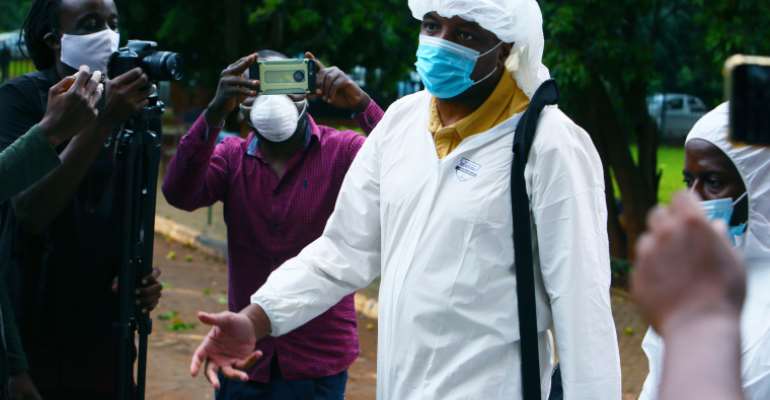 Journalist Hopwell Chin'ono arrives at a magistrates court in Harare, Zimbabwe, on January 9, 2021. Today, the court denied his request for bail. (AP/Tsvangirayi Mukwazhi)