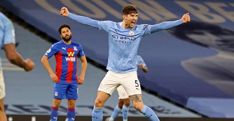 Manchester City's English defender John Stones celebrates after scoring their third goal during the English Premier League football match between Manchester City and Crystal Palace at the Etihad Stadium
Image credit: Getty Images