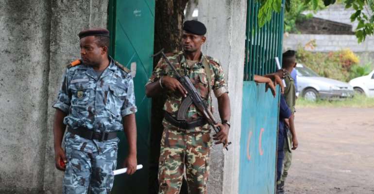 Soldiers are seen in Moroni, Comoros, on April 2, 2019. Authorities recently detained two journalists over their coverage of protests in the city. (AFP/Youssouf Ibrahim)