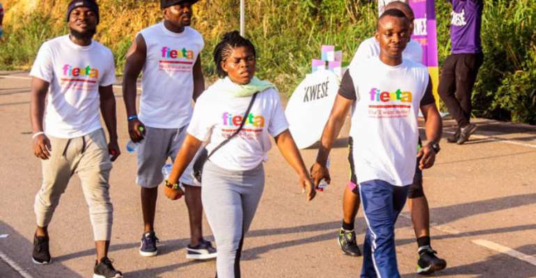 A section of DKT staff during the walk