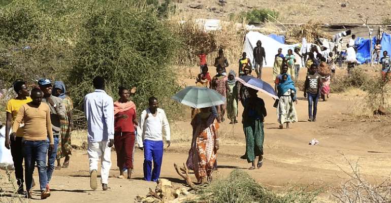 Ethiopian refugees who fled the fighting in Tigray Region are pictured at Um Rakuba camp in Eastern Sudan. - Source: Ashraf Shazly/AFP via Getty Images