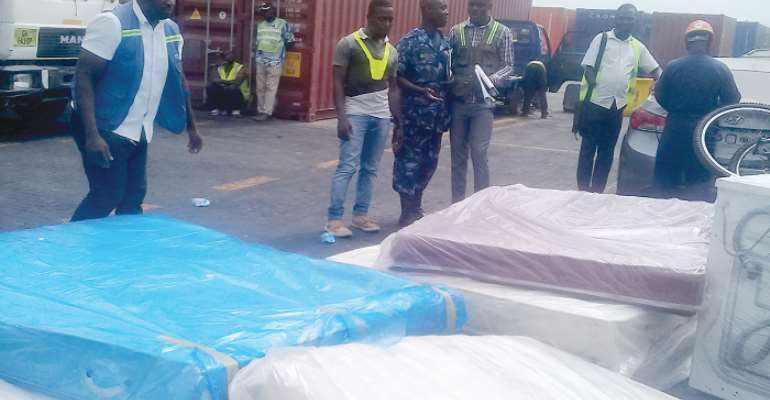 Shipping agents captured negotiating a deal with a customs official.