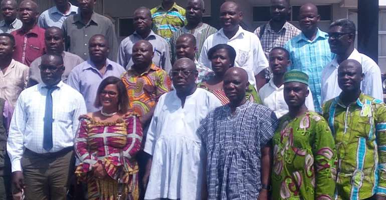 Members of the committee in a group photograph