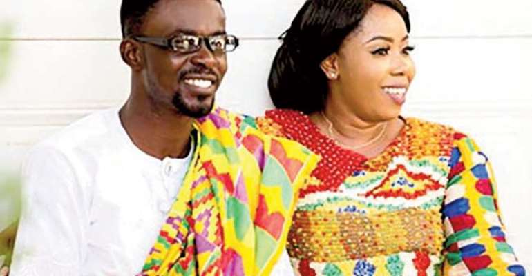 Nana Appiah Mensah aka NAM 1 and his wife, Rose