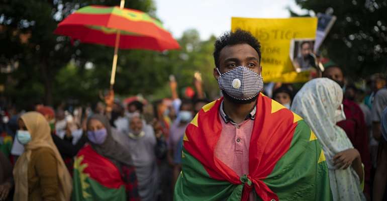 Demonstrators protesting the political situation in Ethiopia in the wake of the death of musician Hachalu Hundessa
- Source: Jeff Wheeler/Star Tribune via Getty Images