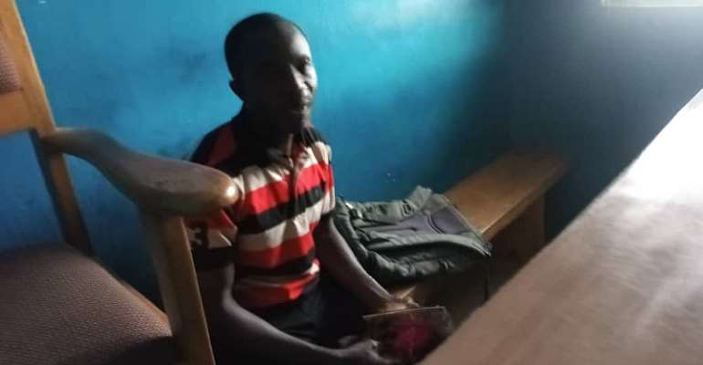 Okese FM journalist Isaac Antwi at the Abodom Police station