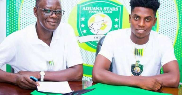 Caleb Amankwah (Right) with Aduana Stars official
