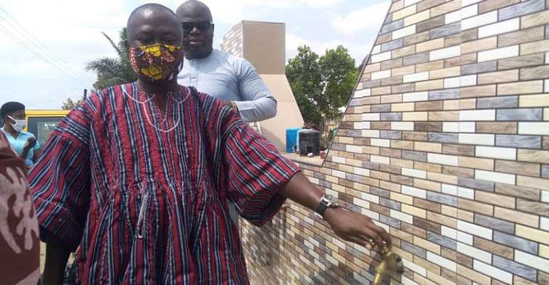 The Minister Turning On One Of The Taps At Tuaboba