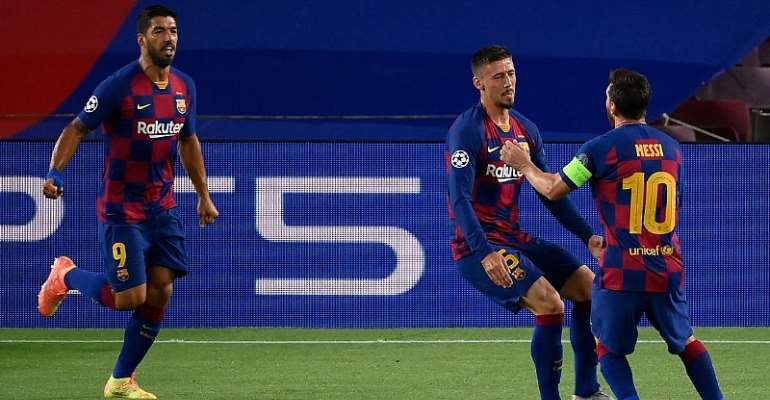 Barcelona's French defender Clement Lenglet (C) celebrates with Barcelona's Argentine forward Lionel Messi (R) and Barcelona's Uruguayan forward Luis Suarez (R) after scoring a goal during the UEFA Champions League round of 16 second leg football match be
Image credit: Getty Images