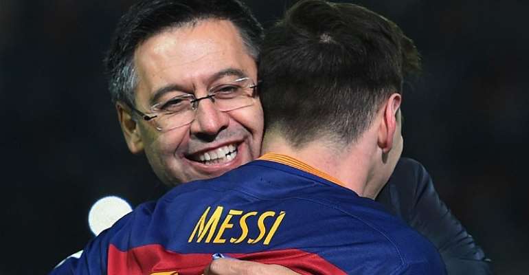 Josep Maria Bartomeu and Lionel Messi