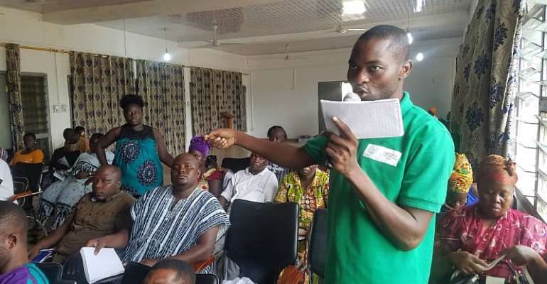 The Director of ORGIIS, Mr. Julius Awaregya, making inputs at clean energy forum in Paga of the Kassena-Nankana West District