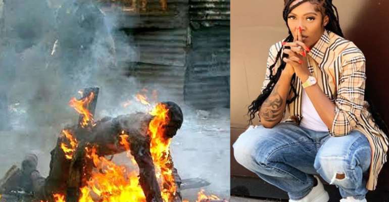 A foreigner being burnt alive in SA… Tiwa Savage