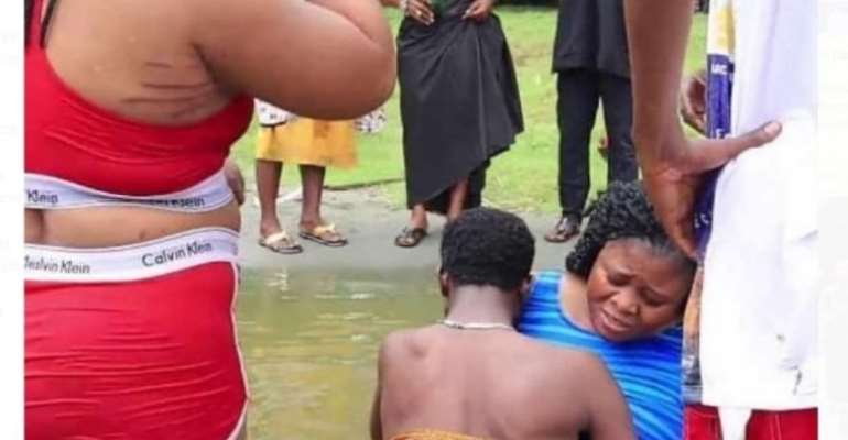 (WATCH) Couple get stuck while 'Chopping themselves' in Lake Bosomtwi, provoke the gods