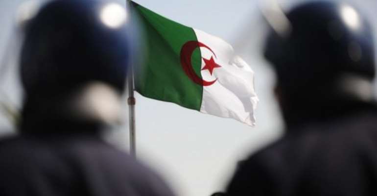 Policemen are pictured in 2011 in Algiers. By Farouk Batiche (AFP/File)