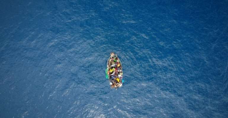 A boat in the Strait of Gibraltar carrying migrants who were rescued on September 8, 2018. By Marcos Moreno (AFP/File)