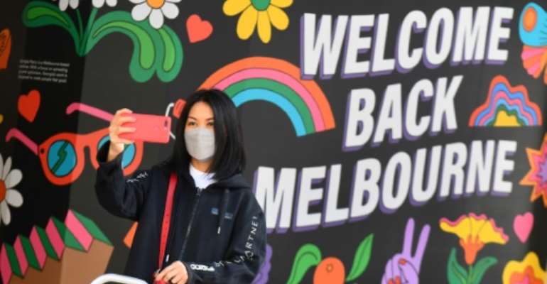 A months-long lockdown was lifted in Melbourne as Australia's second biggest city got its virus outbreak under control. By William WEST (AFP)